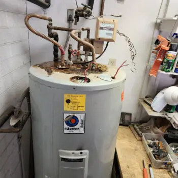Old rusty water heater repair