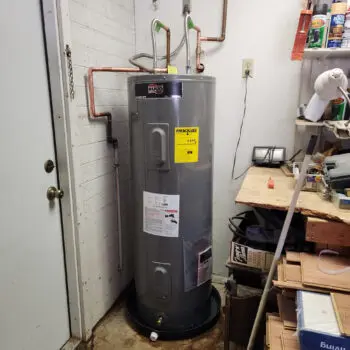 Basement water heater plumbing repair