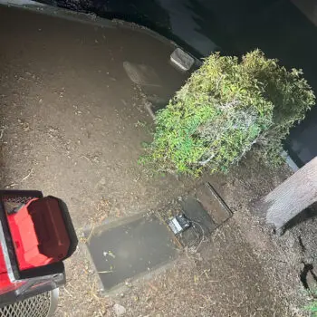 Flooded outdoor area emergency plumbing needed