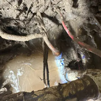 Burst pipe in muddy ground