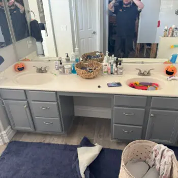 Bathroom sinks with various toiletries